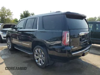 2015 GMC Yukon Denali with VIN 1GKS2CKJXFR547358, listed as a Copart auction lot 63906734 with 163,980 mi miles and Salvage Title. Bid and sale history available at carsss.com. Image 2.