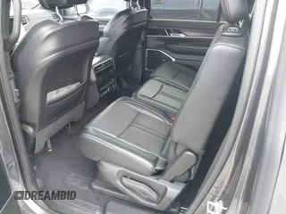 2023 Jeep Wagoneer Series II with VIN 1C4SJVBPXPS515874, listed as a IAAI auction lot 42728894 with 56,284 mi miles and . Bid and sale history available at DreamBid. Image 8.