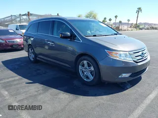 2013 Honda Odyssey Touring with VIN 5FNRL5H95DB045666, listed as a IAAI auction lot 42117219 with 50,715 mi miles and . Bid and sale history available at carsss.com. Image 1.