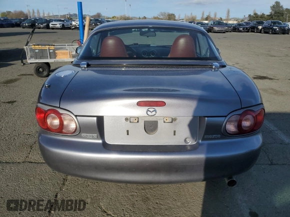 2002 Mazda MX-5 Miata Cloth with VIN JM1NB353X20228420, listed as a Copart auction lot 47949235 with 94,341 mi miles and Salvage title. Bid and sale history available at DreamBid. Image 6.