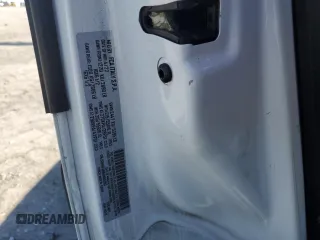 2022 Ram ProMaster City Cargo Tradesman with VIN ZFBHRFAB1N6W65993, listed as a Copart auction lot 51974955 with 55,141 mi miles and Salvage Title. Bid and sale history available at DreamBid. Image 13.