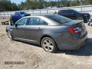 2016 Ford Taurus SEL with VIN 1FAHP2E87GG137713, listed as a Copart auction lot 52519035 with 134,227 mi miles and Salvage Title. Bid and sale history available at DreamBid. Image 2.