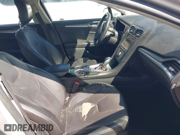 2014 Ford Fusion Titanium Hybrid with VIN 3FA6P0RUXER103516, listed as a IAAI auction lot 42004602 with 128,287 mi miles and . Bid and sale history available at carsss.com. Image 5.