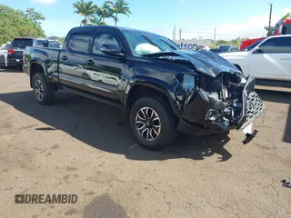 2023 Toyota Tacoma SR5 z VIN 3TYDZ5BN0PT021200, wystawiony jako IAAI lot #41432508 z przebiegiem 5 214 mil mil oraz . Historia ofert i sprzedaży dostępna na DreamBid. Obrazek 1.
