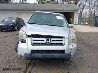 2006 Honda Pilot EX with VIN 2HKYF18426H553632, listed as a IAAI auction lot 41656610 with 154,470 mi miles. Bid and sale history available at carsss.com. Image 13.