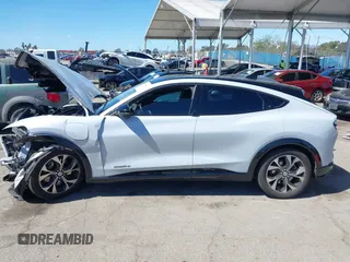 2021 Ford Mustang Mach-E Premium with VIN 3FMTK3RM5MMA60868, listed as a IAAI auction lot 41825849 with 60,119 mi miles and . Bid and sale history available at DreamBid. Image 14.