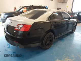 2013 Ford Police Interceptor with VIN 1FAHP2M87DG124585, listed as a IAAI auction lot 41863360 with 189,705 mi miles and . Bid and sale history available at DreamBid. Image 4.