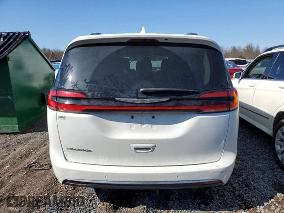 2021 Chrysler Pacifica Touring L with VIN 2C4RC1BGXMR532883, listed as a Copart auction lot 50173485 with 154,431 mi miles and Salvage Title. Bid and sale history available at DreamBid. Image 6.