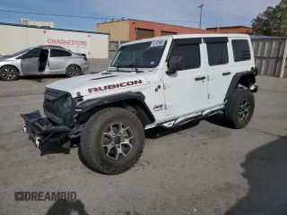 2021 Jeep Wrangler Unlimited Rubicon with VIN 1C4JJXFM6MW818162, listed as a Copart auction lot 42187885 with 34,273 mi miles and Salvage Title. Bid and sale history available at carsss.com. Image 1.