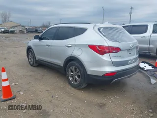 2016 Hyundai Santa Fe z VIN 5XYZU3LB0GG327660, wystawiony jako IAAI lot #42080530 z przebiegiem 109 602 mil mil oraz . Historia ofert i sprzedaży dostępna na DreamBid. Obrazek 3.