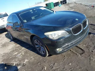 2011 BMW 7 Series 740i with VIN WBAKA4C58BC392020, listed as a IAAI auction lot 41314751 with 116,553 mi miles. Bid and sale history available at carsss.com. Image 1.