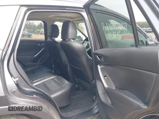 2016 Mazda CX-5 Grand Touring with VIN JM3KE4DYXG0830150, listed as a IAAI auction lot 41961007 with 142,570 mi miles and . Bid and sale history available at DreamBid. Image 8.