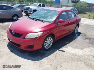 2010 Toyota Corolla with VIN 1NXBU4EE0AZ258145, listed as a IAAI auction lot 42069982 with 238,906 mi miles. Bid and sale history available at carsss.com. Image 2.
