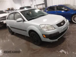 2008 Kia Rio LX with VIN KNADE163186345215, listed as a IAAI auction lot 41776000 with 141,859 mi miles. Bid and sale history available at carsss.com. Image 1.