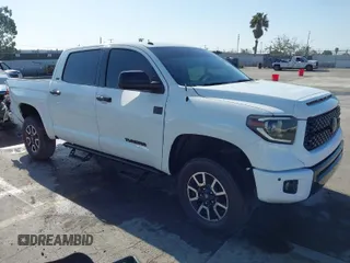 2018 Toyota Tundra 2WD SR5 with VIN 5TFEM5F11JX128585, listed as a IAAI auction lot 41965169 with 83,149 mi miles. Bid and sale history available at carsss.com. Image 1.