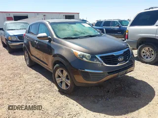 2013 Kia Sportage LX z VIN KNDPB3A20D7375426, wystawiony jako IAAI lot #42444076 z przebiegiem 227 337 mil mil oraz . Historia ofert i sprzedaży dostępna na DreamBid. Obrazek 1.
