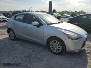 2017 Toyota Yaris iA with VIN 3MYDLBYVXHY169160, listed as a Copart auction lot 52420785 with 106,283 mi miles and Salvage Title. Bid and sale history available at carsss.com. Image 4.
