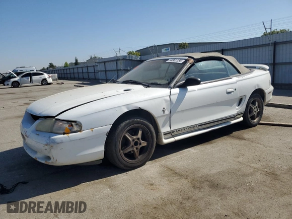 1998 Ford Mustang with VIN 1FAFP4448WF269580, listed as a Copart auction lot 54861155 with 304,869 mi miles and Salvage title. Bid and sale history available at DreamBid. Image 1.