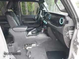 2021 Jeep Wrangler Unlimited Sahara with VIN 1C4HJXEG0MW703812, listed as a IAAI auction lot 42186089 with 50,349 mi miles and . Bid and sale history available at DreamBid. Image 5.