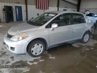 2010 Nissan Versa S with VIN 3N1BC1AP6AL429538, listed as a Copart auction lot 66211325 with 116,777 mi miles and Salvage title. Bid and sale history available at DreamBid. Image 1.