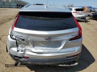 2020 Cadillac XT4 AWD Premium Luxury z VIN 1GYFZDR44LF026447, wystawiony jako Copart lot #53970785 z przebiegiem 118 035 mil mil oraz Szkody całkowita. Historia ofert i sprzedaży dostępna na DreamBid. Obrazek 6.