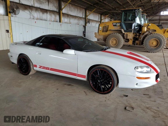 2001 Chevrolet Camaro Z28 z VIN 2G1FP22G612106148, wystawiony jako Copart lot #51154555 z przebiegiem 81 209 mil mil oraz Szkoda całkowita • Salvage title. Historia ofert i sprzedaży dostępna na DreamBid. Obrazek 4.