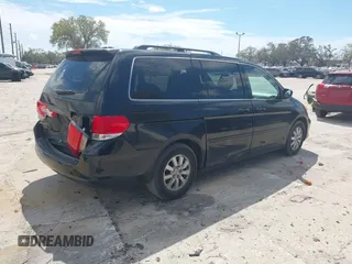 2010 Honda Odyssey EX-L with VIN 5FNRL3H79AB028724, listed as a IAAI auction lot 41687998 with 221,852 mi miles. Bid and sale history available at carsss.com. Image 4.