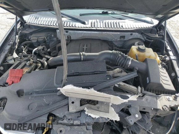 2015 Lincoln Navigator with VIN 5LMJJ2HT4FEJ14227, listed as a Copart auction lot 45225485 with 84,733 mi miles and Salvage title. Bid and sale history available at DreamBid. Image 12.