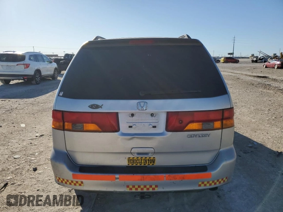 2003 Honda Odyssey EX-L with VIN 5FNRL18943B157513, listed as a Copart auction lot 47135305 with 199,079 mi miles and Salvage Title. Bid and sale history available at DreamBid. Image 6.