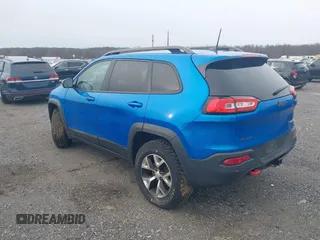 2018 Jeep Cherokee Trailhawk with VIN 1C4PJMBX2JD570976, listed as a IAAI auction lot 41610469 with 151,255 mi miles. Bid and sale history available at carsss.com. Image 3.