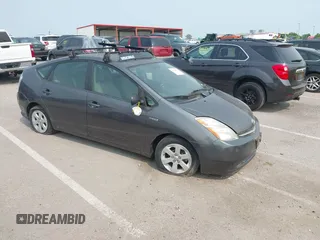 2007 Toyota Prius z VIN JTDKB20U573249632, wystawiony jako IAAI lot #42326573 z przebiegiem Nie podano mil oraz . Historia ofert i sprzedaży dostępna na DreamBid. Obrazek 1.