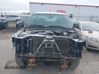 2005 Chevrolet Silverado 1500 with VIN 1GCEK19V65E152928, listed as a IAAI auction lot 41485115 with 165,560 mi miles. Bid and sale history available at carsss.com. Image 12.