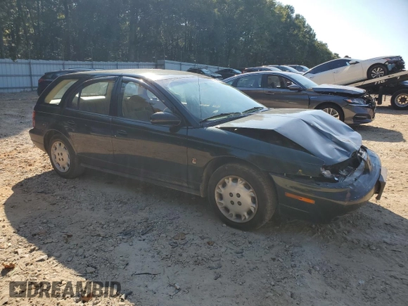 1997 Saturn SW z VIN 1G8ZK8278VZ379899, wystawiony jako Copart lot #74913664 z przebiegiem 126 186 mil mil oraz Szkoda całkowita • Salvage title. Historia ofert i sprzedaży dostępna na DreamBid. Obrazek 4.