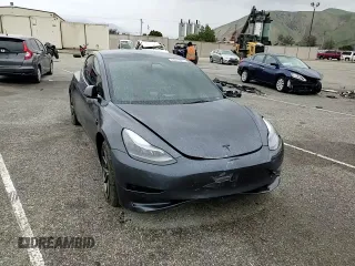 2023 Tesla Model 3 with VIN 5YJ3E1EA9PF543672, listed as a Copart auction lot 48211035 with Not Provided miles and Salvage Title. Bid and sale history available at DreamBid. Image 11.