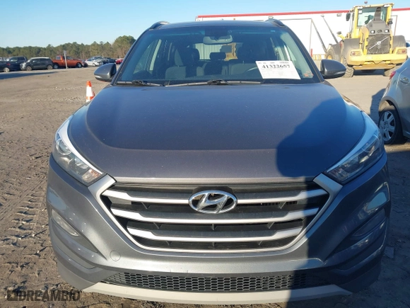 2018 Hyundai Tucson Value with VIN KM8J3CA2XJU776526, listed as a IAAI auction lot 41322657 with 102,444 mi miles. Bid and sale history available at carsss.com. Image 12.