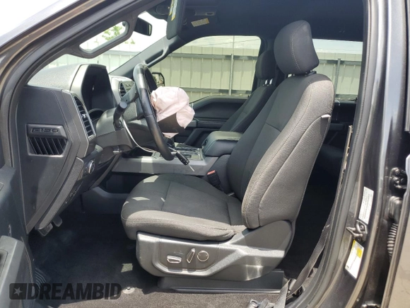 2018 Ford F-150 XL with VIN 1FTEW1EG7JFC40015, listed as a Copart auction lot 60659755 with 194,645 mi miles and Salvage title. Bid and sale history available at DreamBid. Image 7.