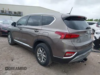 2019 Hyundai Santa Fe SE z VIN 5NMS23AD2KH014037, wystawiony jako IAAI lot #42110778 z przebiegiem 48 975 mil mil oraz . Historia ofert i sprzedaży dostępna na DreamBid. Obrazek 3.