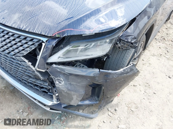 2022 Lexus RX 350 with VIN 2T2HZMDA8NC363464, listed as a IAAI auction lot 42070240 with 34,123 mi miles and . Bid and sale history available at DreamBid. Image 6.