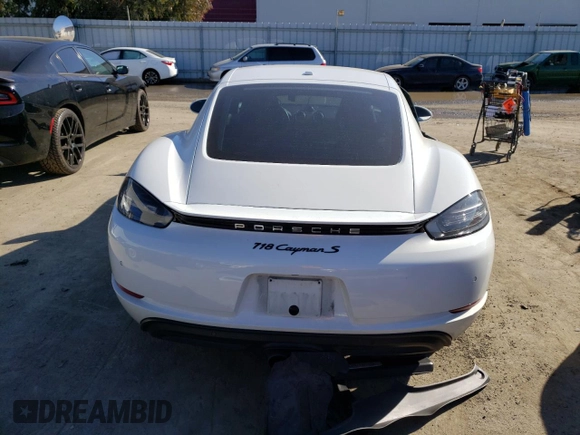 2017 Porsche Cayman S with VIN WP0AB2A81HS285810, listed as a Copart auction lot 39980703 with 49,974 mi miles and . Bid and sale history available at DreamBid. Image 6.
