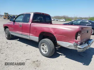 1999 Dodge Dakota SLT z VIN 1B7GL22X2XS222162, wystawiony jako IAAI lot #42038943 z przebiegiem 222 883 mil mil oraz . Historia ofert i sprzedaży dostępna na DreamBid. Obrazek 3.