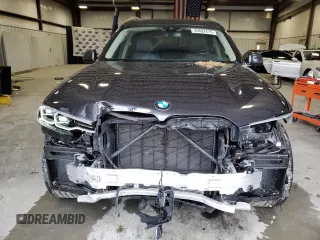 2021 BMW X7 xDrive40i with VIN 5UXCW2C0XM9H51936, listed as a Copart auction lot 45892475 with 49,554 mi miles and Salvage Title. Bid and sale history available at carsss.com. Image 5.
