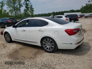 2014 Kia Cadenza Premium z VIN KNALN4D71E5121043, wystawiony jako Copart lot #59667395 z przebiegiem 244 797 mil mil oraz Czysty tytuł • Clean title. Historia ofert i sprzedaży dostępna na DreamBid. Obrazek 2.