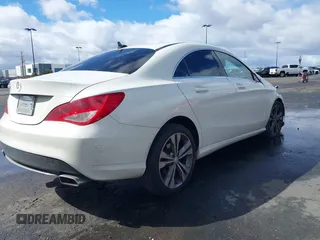 2015 Mercedes-Benz CLA 250 with VIN WDDSJ4EB8FN203842, listed as a IAAI auction lot 41734568 with 143,848 mi miles and . Bid and sale history available at DreamBid. Image 4.