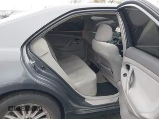 2009 Toyota Camry LE z VIN 4T1BK46K49U093612, wystawiony jako IAAI lot #41847395 z przebiegiem 250 383 mil mil oraz . Historia ofert i sprzedaży dostępna na DreamBid. Obrazek 8.