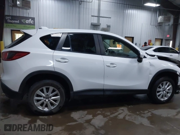 2014 Mazda CX-5 Touring with VIN JM3KE4CY4E0349034, listed as a IAAI auction lot 41478954 with 117,502 mi miles. Bid and sale history available at carsss.com. Image 13.