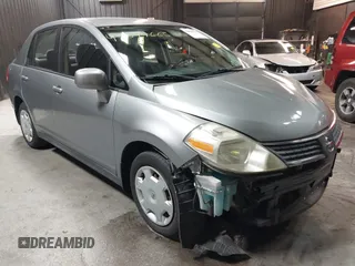 2009 Nissan Versa 1.8 S with VIN 3N1BC11EX9L396439, listed as a IAAI auction lot 42049665 with 49,617 mi miles. Bid and sale history available at carsss.com. Image 1.