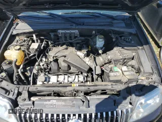 2005 Mercury Mariner Luxury z VIN 4M2CU57135DJ21208, wystawiony jako Copart lot #53555425 z przebiegiem 95 409 mil mil oraz Szkody całkowita. Historia ofert i sprzedaży dostępna na DreamBid. Obrazek 14.