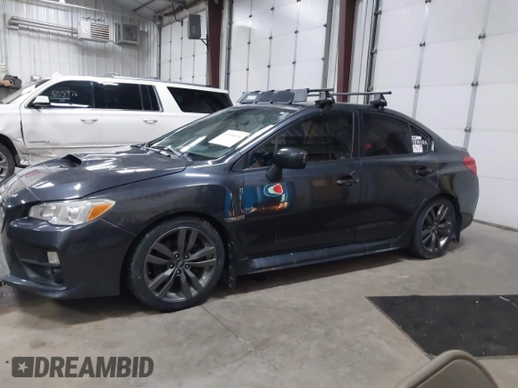 2016 Subaru WRX Premium with VIN JF1VA1E69G8801517, listed as a IAAI auction lot 41558194 with 118,332 mi miles. Bid and sale history available at carsss.com. Image 14.