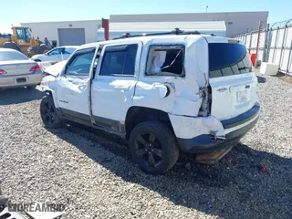 2014 Jeep Patriot Sport with VIN 1C4NJPBA9ED889186, listed as a IAAI auction lot 41738524 with 159,755 mi miles. Bid and sale history available at carsss.com. Image 3.