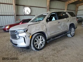 2021 Chevrolet Tahoe High Country with VIN 1GNSCTKL2MR117385, listed as a Copart auction lot 65074284 with 0 mi miles and Salvage Title. Bid and sale history available at carsss.com. Image 1.